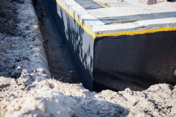 Professional Interior Drainage System technician working in Barberton, OH